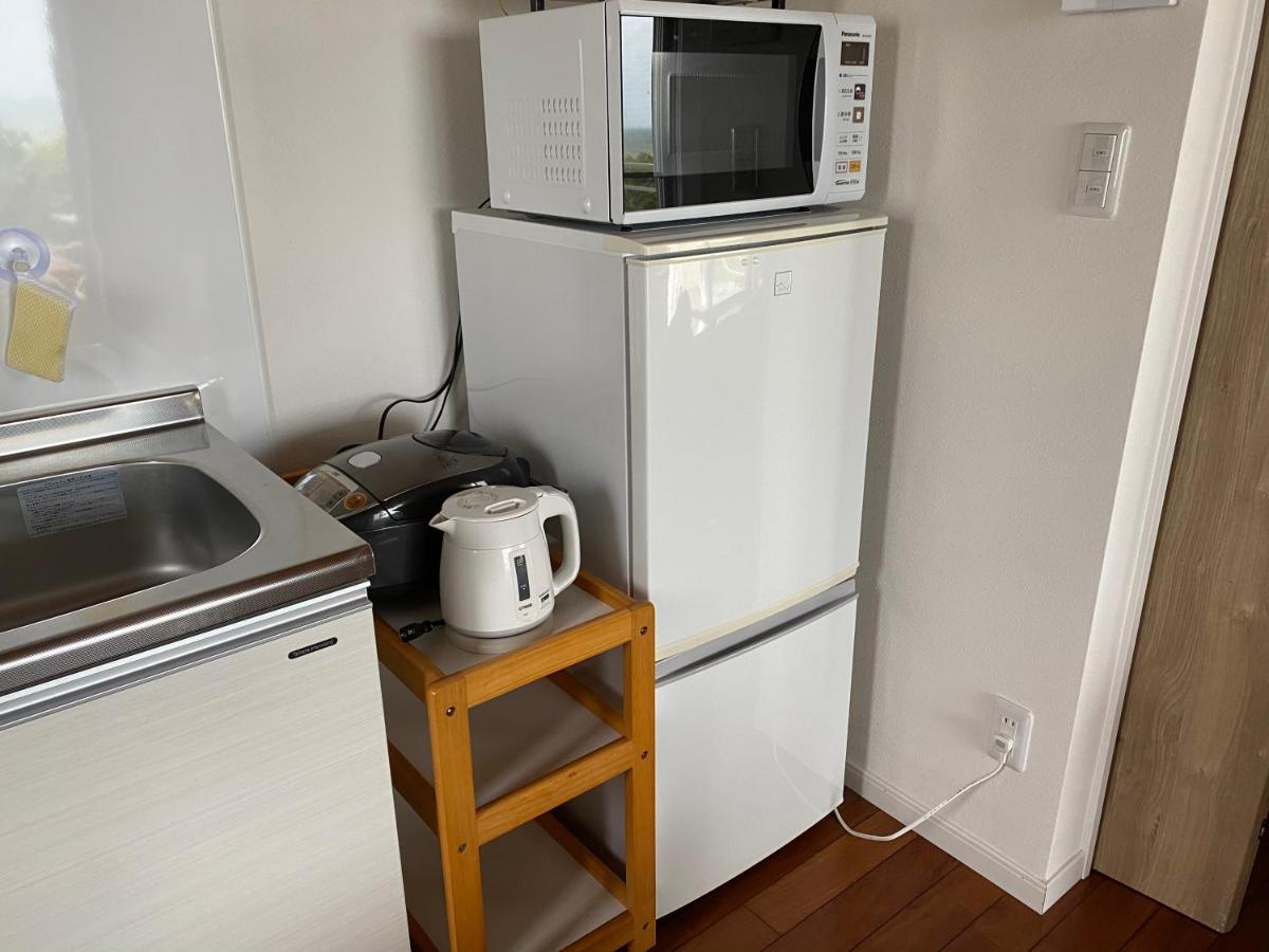 Apartamento Ocean Front Sumuide Nago Exterior foto