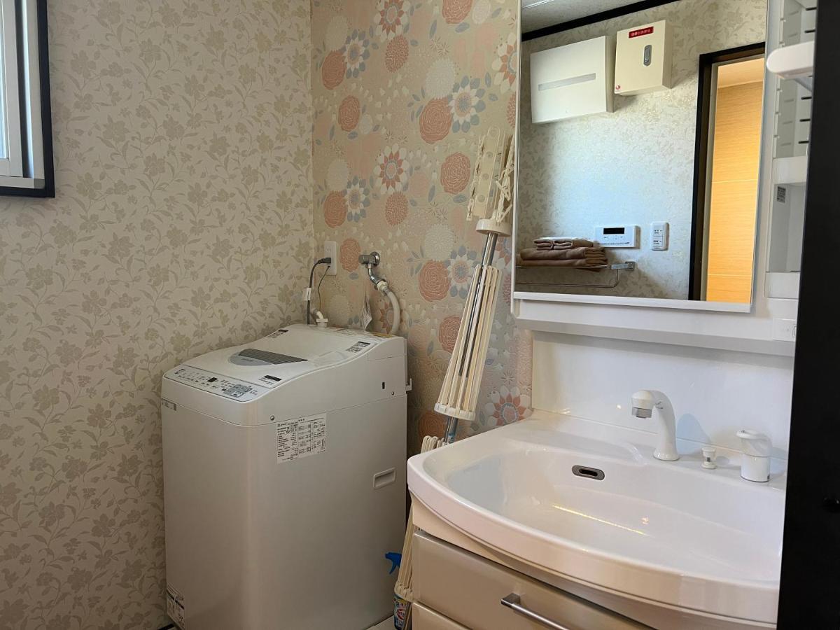 Apartamento Ocean Front Sumuide Nago Exterior foto