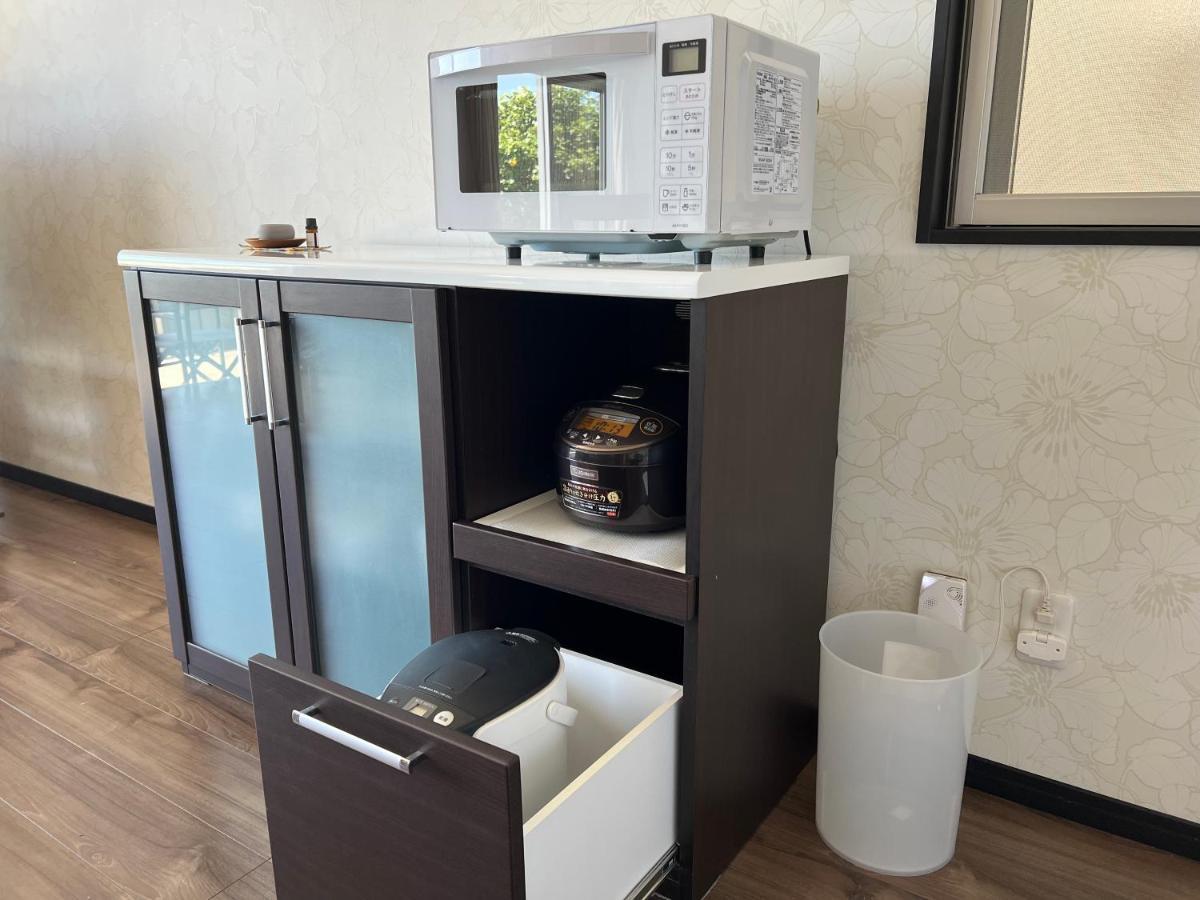 Apartamento Ocean Front Sumuide Nago Exterior foto