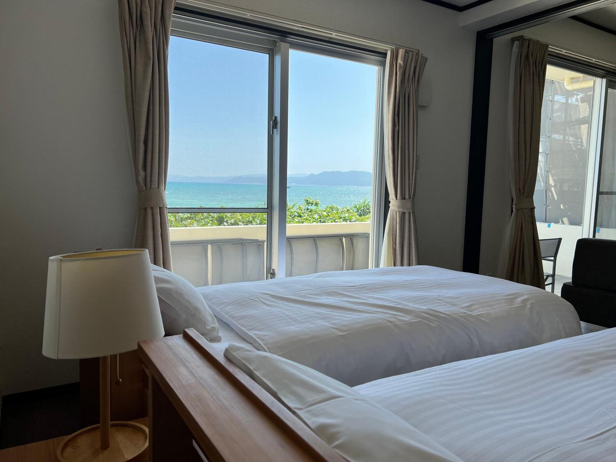 Apartamento Ocean Front Sumuide Nago Exterior foto
