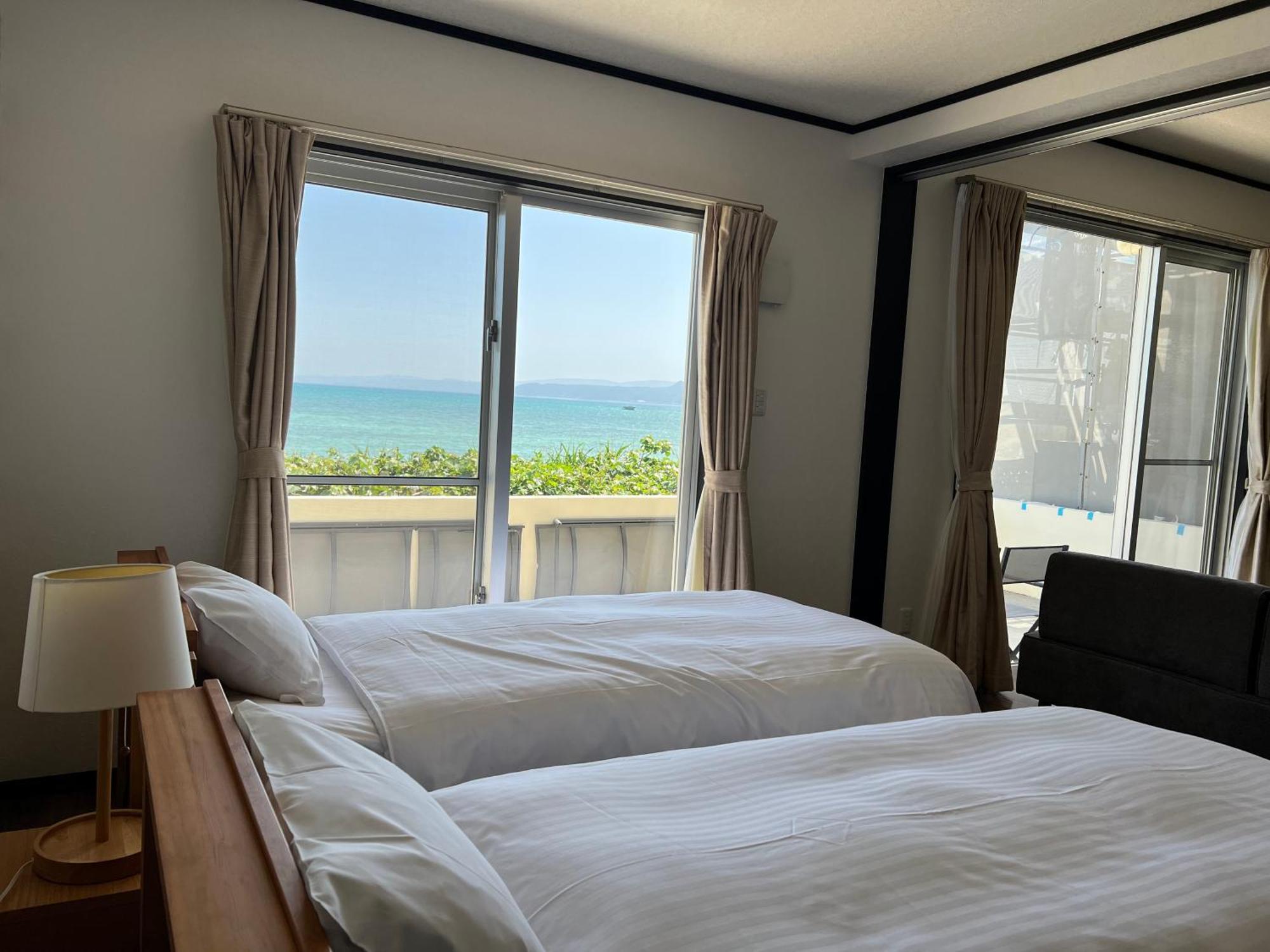 Apartamento Ocean Front Sumuide Nago Exterior foto